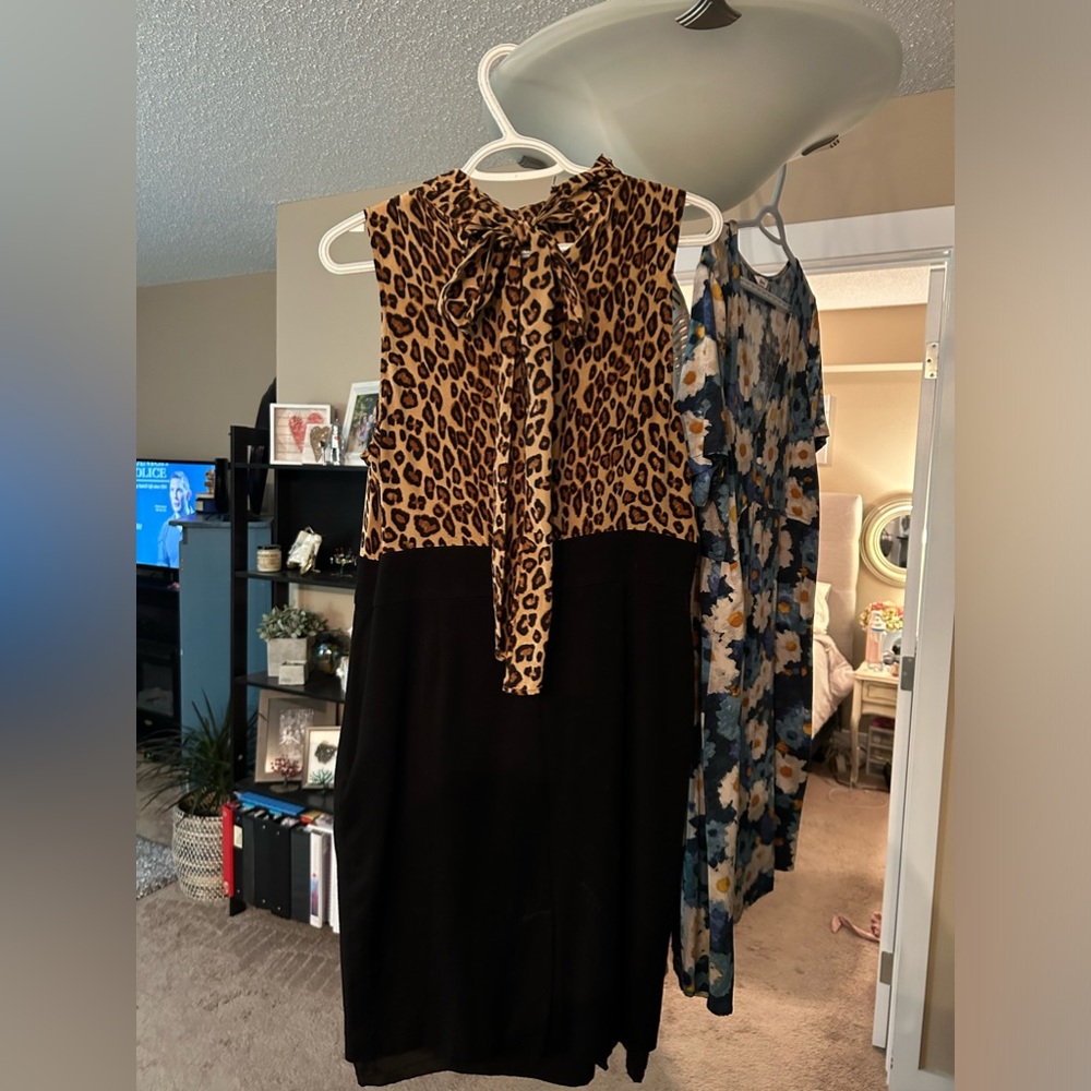 Beautiful silky cheetah print upper bodice with fitted lower bodice dress.